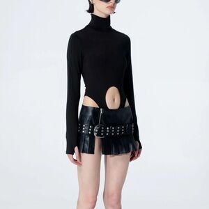 The Kript Black Pleated Faux Leather Mini Skirt with Studded Belt